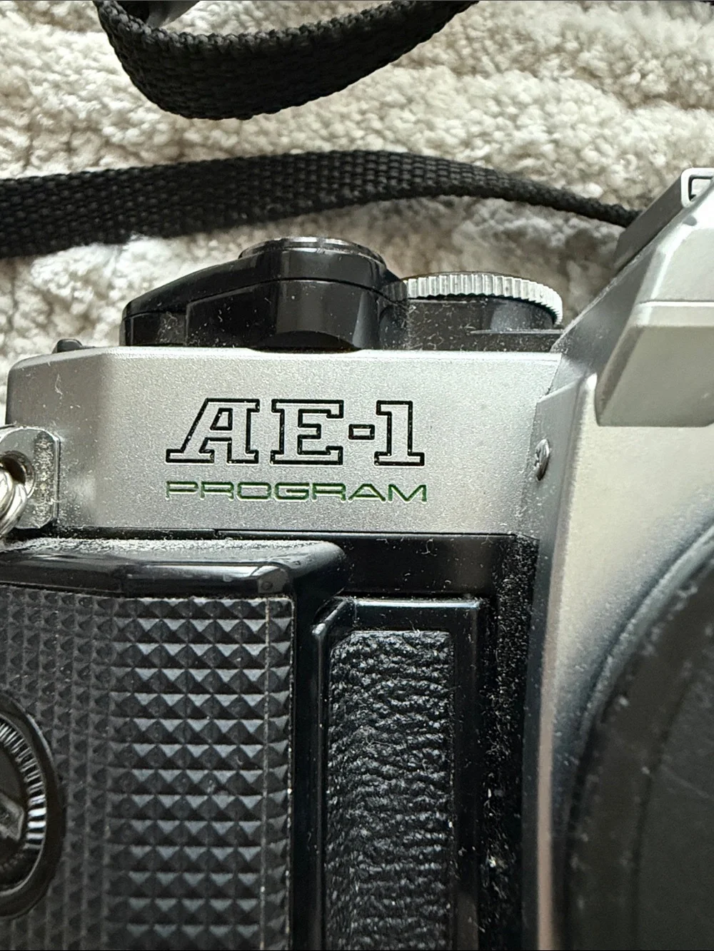 Canon AE-1 Film Camera in Silver and Black with Strap